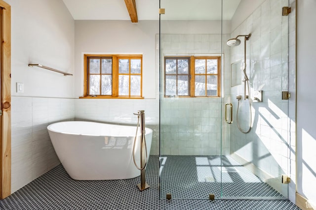 2667 Aspen Springs Dr, Park City, UT 84060 - bathroom featuring a soaking tub, a shower stall, tile walls, healthy amount of natural light, and tile patterned flooring