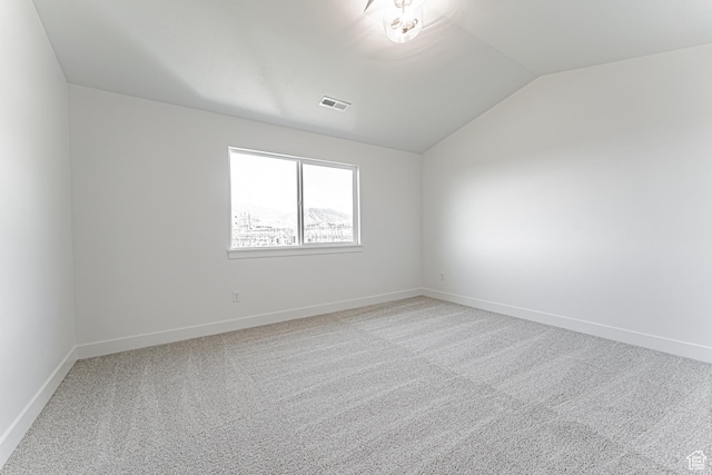 712 W 4500 S Unit 304, Mapleton, UT 84664 - carpeted spare room with vaulted ceiling and baseboards