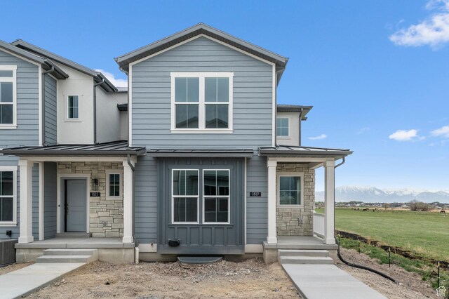 1819 N 3530 W, Lehi, UT 84043 - view of front facade featuring stone siding, a standing seam roof, and metal roof