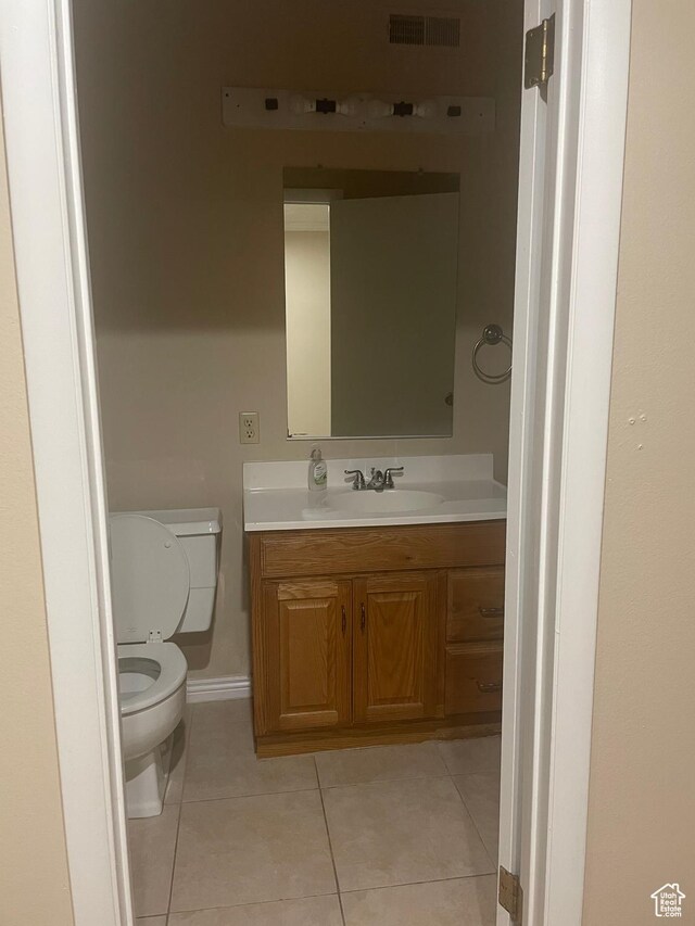 1502 S 325 W, Hurricane, UT 84737 - bathroom with tile patterned flooring, visible vents, vanity, and toilet