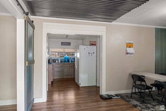 1502 S 325 W, Hurricane, UT 84737 - hallway with ornamental molding, dark wood finished floors, baseboards, and a barn door