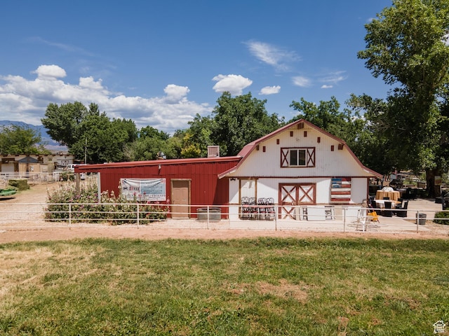1502 S 325 W, Hurricane, UT 84737 - back of house with an outbuilding, a yard, a gambrel roof, fence, and a barn