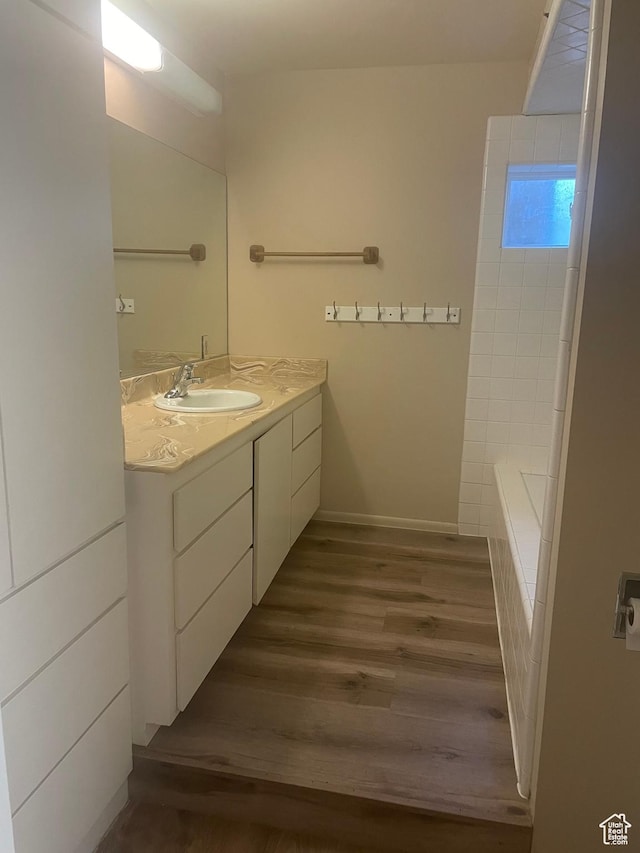 1502 S 325 W, Hurricane, UT 84737 - bathroom featuring baseboards, wood finished floors, and vanity