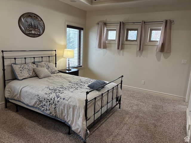 5818 Cambridge Dr, Mountain Green, UT 84050 - carpeted bedroom featuring baseboards and multiple windows