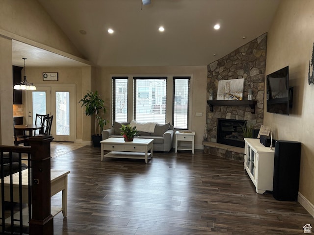 5818 Cambridge Dr, Mountain Green, UT 84050 - living room with dark wood-style flooring, baseboards, and a healthy amount of sunlight