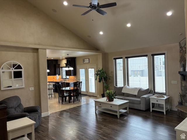 5818 Cambridge Dr, Mountain Green, UT 84050 - living room featuring dark wood-style flooring, a ceiling fan, high vaulted ceiling, and recessed lighting