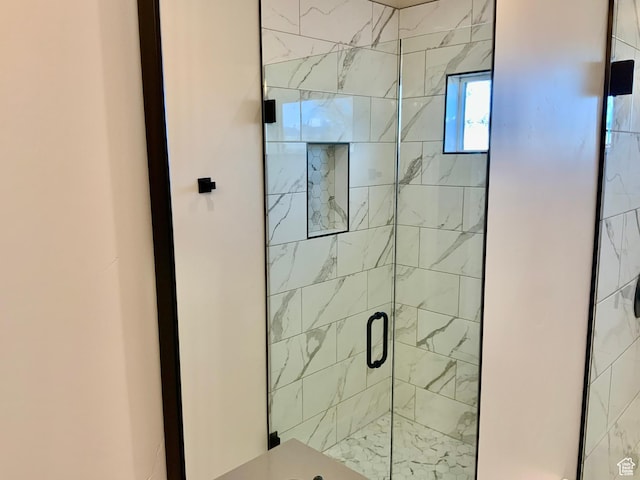 full bathroom with a shower stall