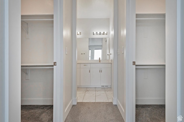 interior space with visible vents and a sink