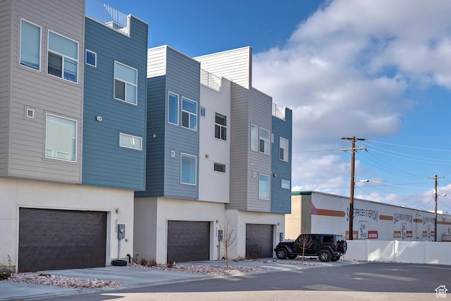 view of building exterior featuring a garage