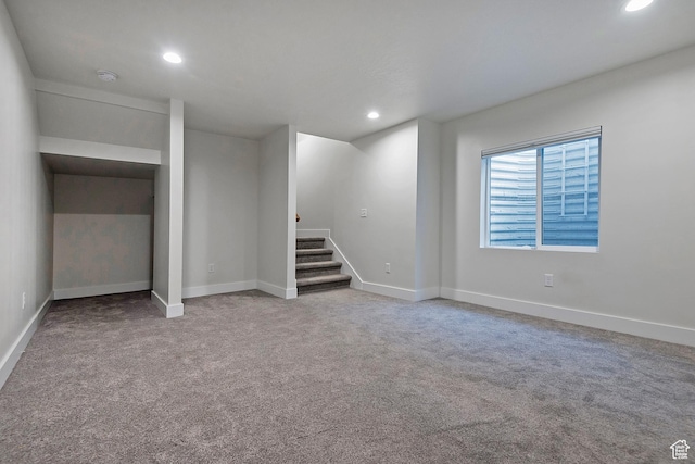 interior space featuring baseboards, carpet flooring, and recessed lighting