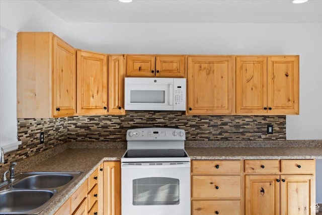 6357 W 3570 S, West Valley City, UT 84128 - kitchen with white appliances, light brown cabinets, a sink, and backsplash