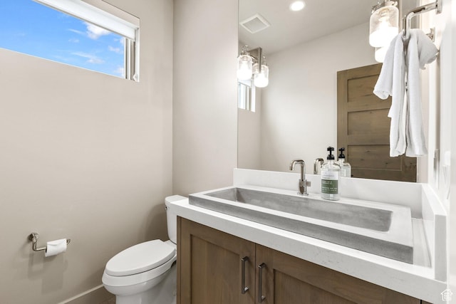 6427 Double Deer Loop, Park City, UT 84098 - half bath with visible vents, toilet, vanity, and baseboards