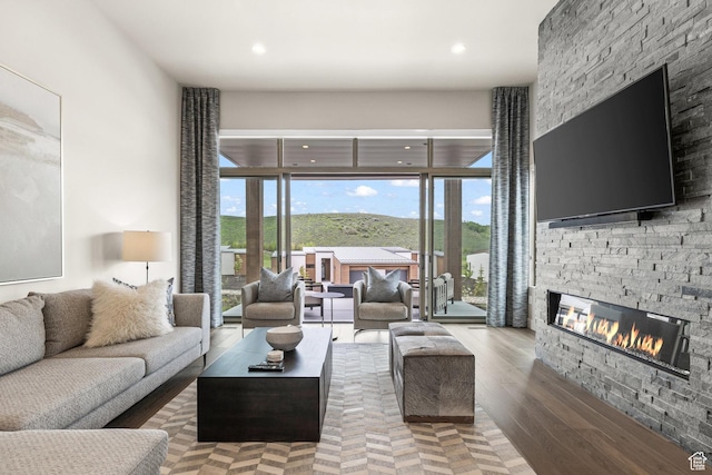 6427 Double Deer Loop, Park City, UT 84098 - living area with a stone fireplace, recessed lighting, and wood finished floors
