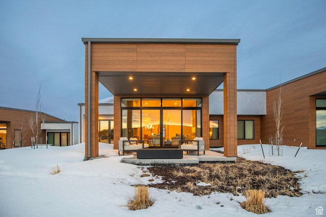 6427 Double Deer Loop, Park City, UT 84098 - snow covered rear of property with outdoor lounge area