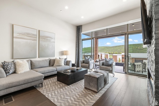 6427 Double Deer Loop, Park City, UT 84098 - living area featuring recessed lighting, visible vents, a stone fireplace, and wood finished floors