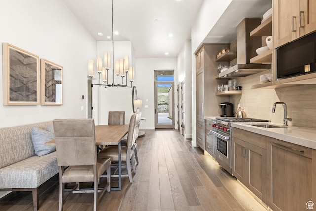 6427 Double Deer Loop, Park City, UT 84098 - kitchen with open shelves, a sink, hardwood / wood-style flooring, tasteful backsplash, and designer range