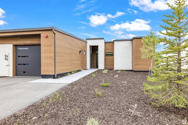6427 Double Deer Loop, Park City, UT 84098 - contemporary home featuring aphalt driveway and an attached garage