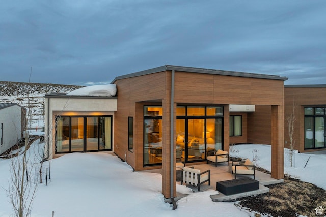 6427 Double Deer Loop, Park City, UT 84098 - snow covered back of property featuring a patio