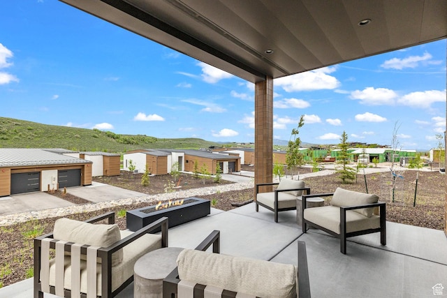 6427 Double Deer Loop, Park City, UT 84098 - view of patio / terrace with an outdoor living space with a fire pit
