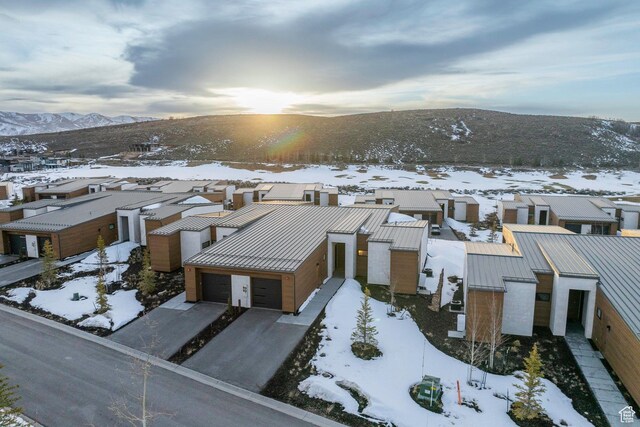 6427 Double Deer Loop, Park City, UT 84098 - snowy aerial view featuring a mountain view and a residential view