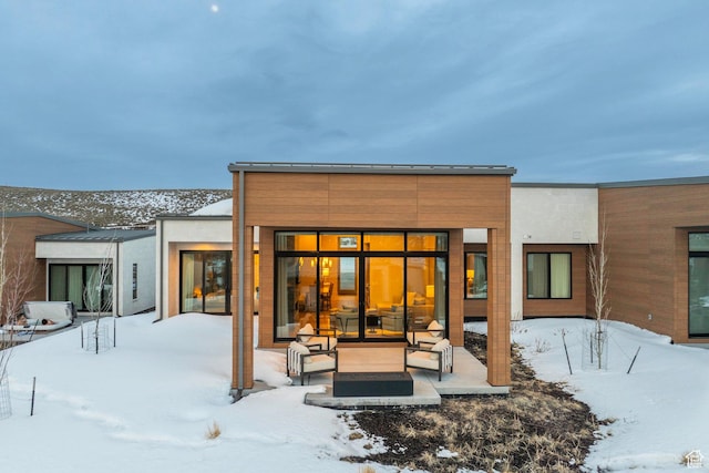 6427 Double Deer Loop, Park City, UT 84098 - snow covered rear of property featuring a patio area
