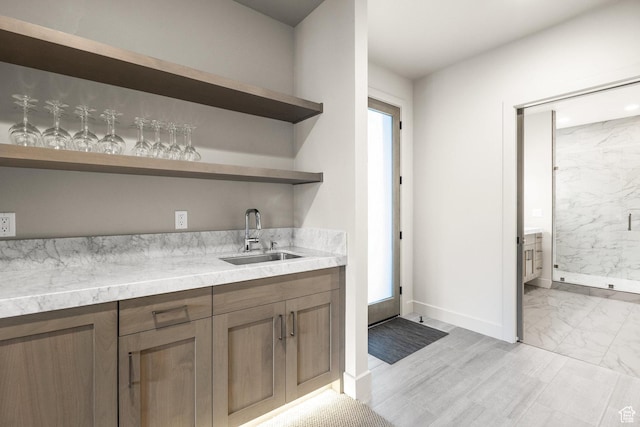6427 Double Deer Loop, Park City, UT 84098 - bar featuring wet bar, baseboards, marble finish floor, and a sink
