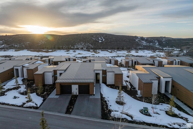 6427 Double Deer Loop, Park City, UT 84098 - snowy aerial view with a mountain view and a residential view