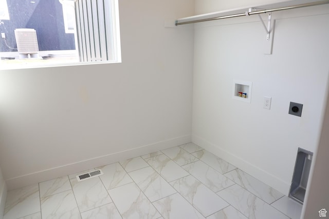 2794 E Liam Ln Unit 101, Eagle Mountain, UT 84005 - laundry room featuring washer hookup, electric dryer hookup, and light marble finish floors