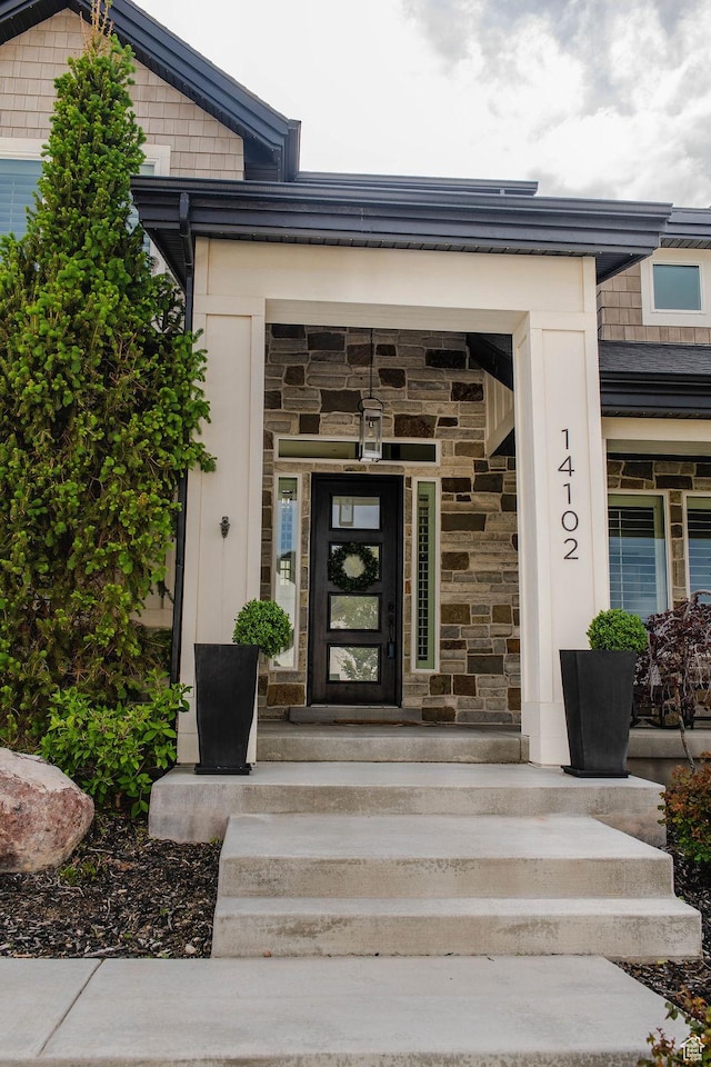 14102 S Sleepy Oaks Ln, Herriman, UT 84096 - entrance to property featuring stone siding and covered porch