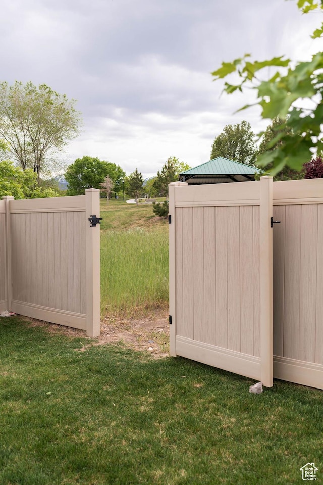 14102 S Sleepy Oaks Ln, Herriman, UT 84096 - view of yard with a gate