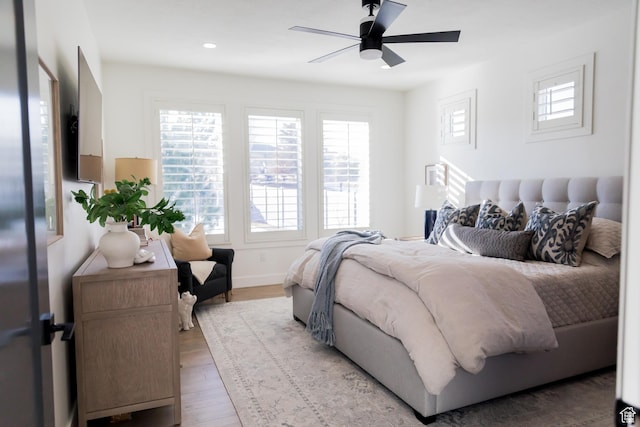 14102 S Sleepy Oaks Ln, Herriman, UT 84096 - bedroom featuring multiple windows, wood finished floors, recessed lighting, baseboards, and ceiling fan