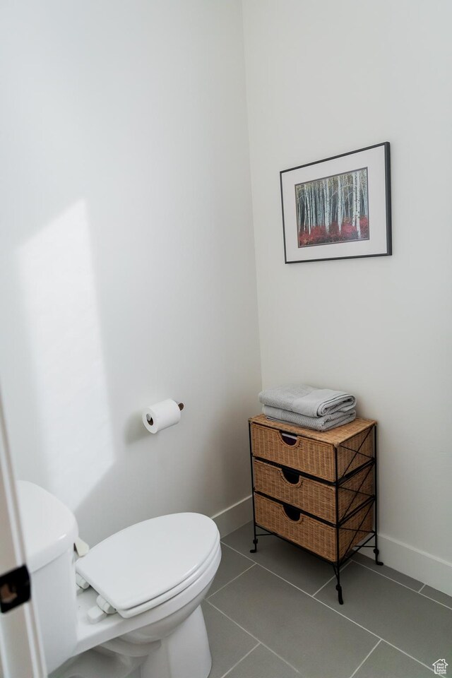 14102 S Sleepy Oaks Ln, Herriman, UT 84096 - bathroom featuring toilet, tile patterned flooring, and baseboards