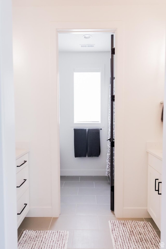 14102 S Sleepy Oaks Ln, Herriman, UT 84096 - bathroom featuring vanity, tile patterned flooring, and baseboards