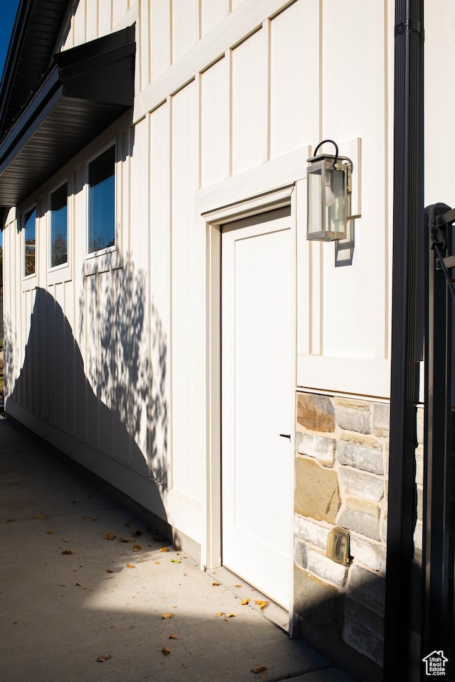 14102 S Sleepy Oaks Ln, Herriman, UT 84096 - doorway to property with board and batten siding