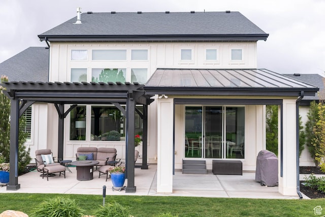 14102 S Sleepy Oaks Ln, Herriman, UT 84096 - rear view of house with an outdoor living space with a fire pit, a patio, a standing seam roof, board and batten siding, and a pergola