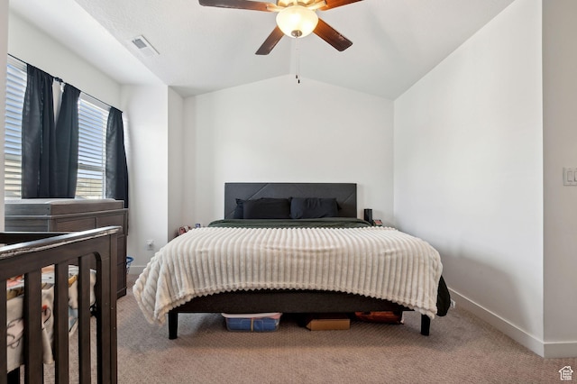 6643 W Skip Rock Rd S, South Jordan, UT 84009 - carpeted bedroom with baseboards, visible vents, vaulted ceiling, and a ceiling fan