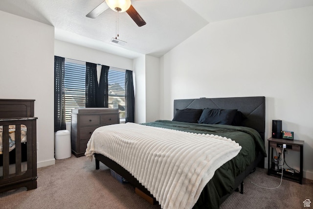 6643 W Skip Rock Rd S, South Jordan, UT 84009 - carpeted bedroom with lofted ceiling, visible vents, ceiling fan, and baseboards