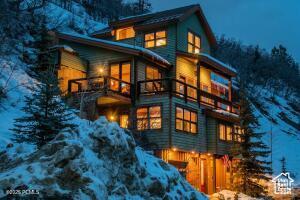 234 Ridge Ave, Park City, UT 84060 - snow covered house with a balcony
