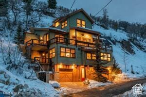 234 Ridge Ave, Park City, UT 84060 - view of front of home featuring a balcony and an attached garage