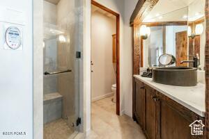 234 Ridge Ave, Park City, UT 84060 - full bath with a shower stall, toilet, and vanity