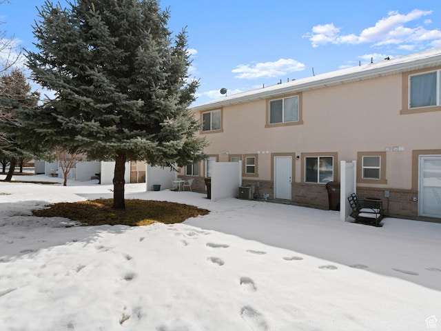 262 W 1975 N Unit 40, Ogden, UT 84414 - multi unit property featuring central AC unit, brick siding, and stucco siding