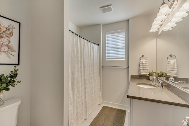 6393 N Pine Tree Way, Eagle Mountain, UT 84005 - full bathroom with visible vents, baseboards, toilet, curtained shower, and vanity