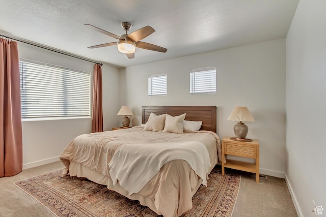 6393 N Pine Tree Way, Eagle Mountain, UT 84005 - bedroom with light colored carpet, baseboards, and a ceiling fan