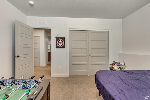 6393 N Pine Tree Way, Eagle Mountain, UT 84005 - bedroom featuring light carpet, baseboards, visible vents, and a closet