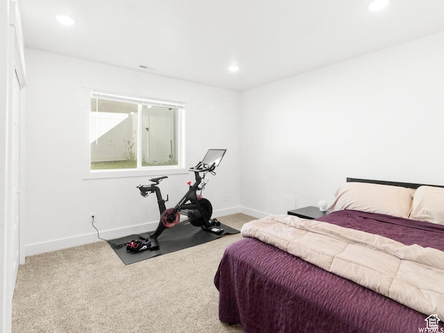 carpeted bedroom with baseboards and recessed lighting