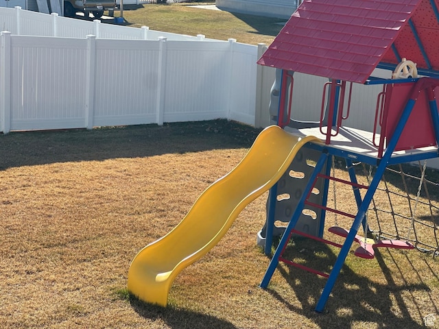 view of play area featuring fence