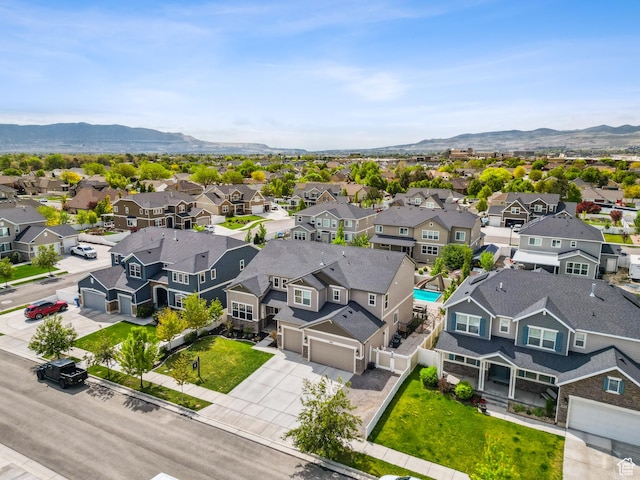 aerial perspective of suburban area featuring mountains