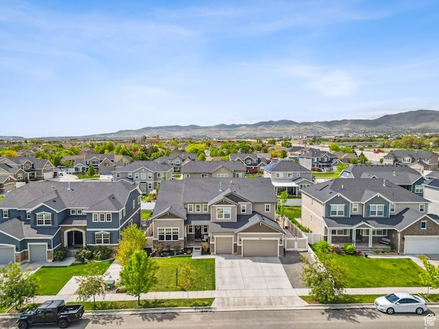 aerial view of residential area with a mountain backdrop