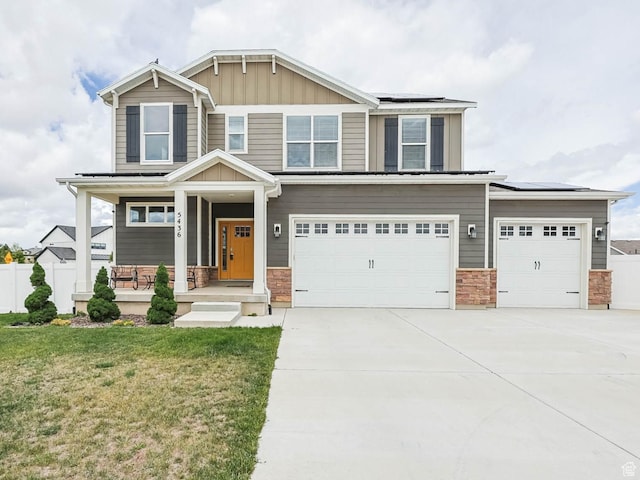 5436 W 9120 S, West Jordan, UT 84081 - craftsman house with a porch, solar panels, board and batten siding, and driveway