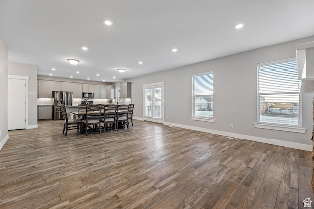 5436 W 9120 S, West Jordan, UT 84081 - dining room with wood finished floors, baseboards, and recessed lighting